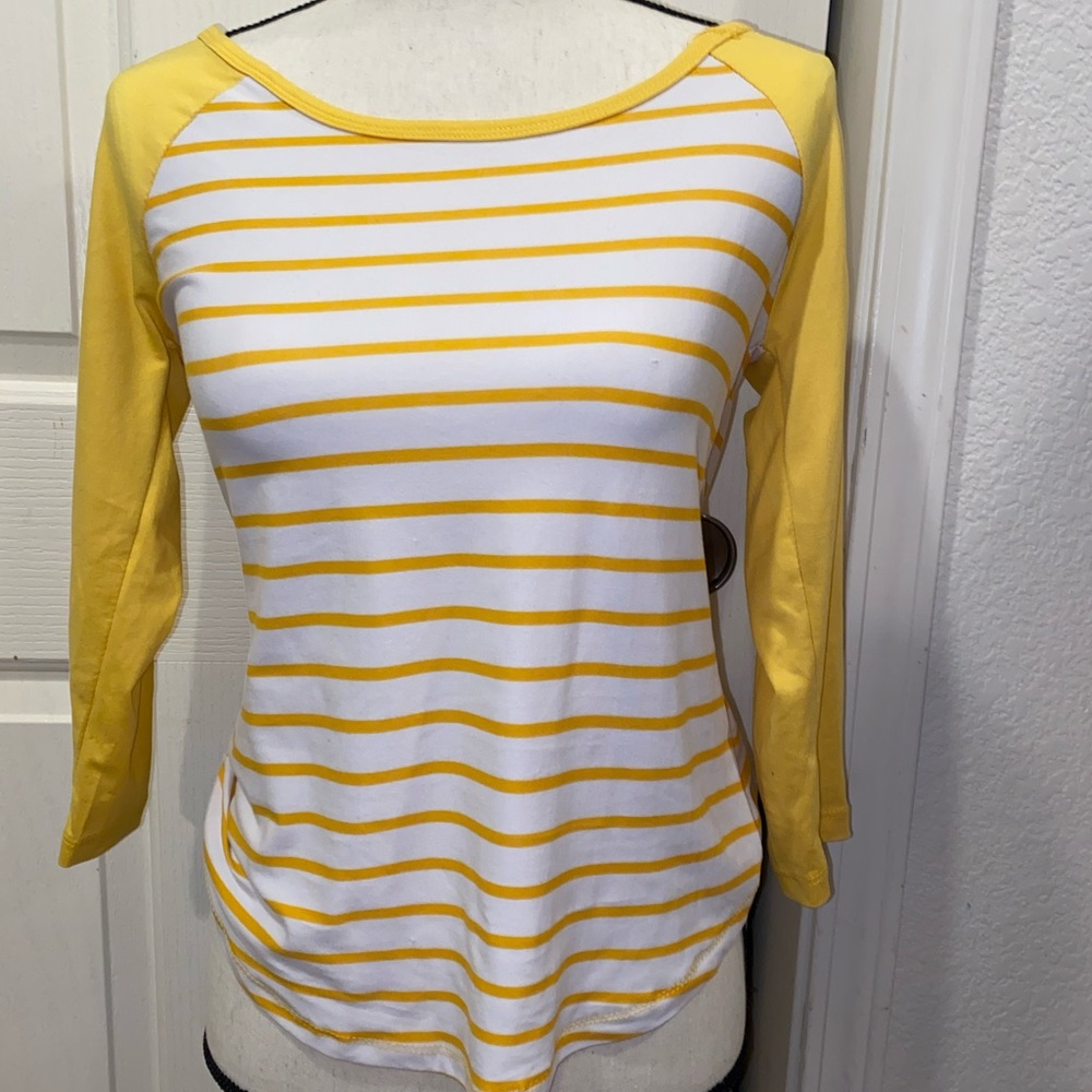 Yellow and white stripped long sleeve shirt.